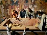 Zawi Hawass, the Egyptian head of the high council for antiquities, supervises the removal of the mummy of Tutankhamun in Luxor in 2007. 
