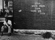 Darryl Cowherd. Stop White Police from Killing Us – St. Louis, MO, c. 1966-67. Gelatin Silver Print. Image: 15 x 19 in., mat: 20 x 24 ¼ in., paper 16 x 20 in.