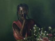African American Female Portrait, Hand on face beside flowers, green background