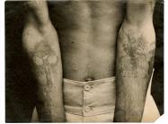 Tattooed inmate, post 1914. Charcoal print.