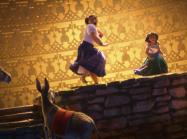 An Encanto film still featuring Louisa and Mirabel standing in front of a golden, geometric background inspired by ancient figurines from the region of current-day Colombia.