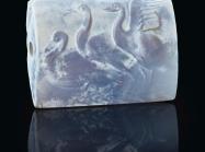 A Minoan Blue Chalcedony Tabloid Seal with Three Swans Late Palace Period, circa 16th century B.C.