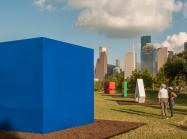 large colorful Carmen Herrera sculptures in a city park
