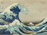 colored woodblock print of a giant wave crashing at sea with small boats beneath it