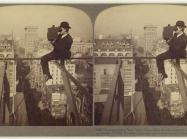 Underwood & Underwood (American, 1881 - 1940s), Photographing New York City - on a slender support 18 stories above pavement of Fifth Avenue., 1905. Gelatin silver print.
