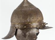 metal helmet with front and back bills, ear flaps and pointed top