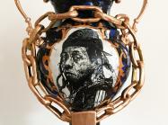 detail of Roberto Lugo ceramic vase with a portrait of Lil Wayne