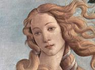 Sandro Boticelli painting of a woman with flowing blonde hair