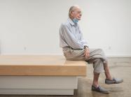 Photo of Wayne Thiebaud taken by Max Whittaker, Posted by Acquavella Galleries. artist is shown seated in the gallery space