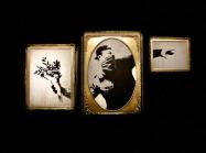 Installation view of Banksy: Genius or Vandal? in Los Angeles, 2021-2022 featuring "love is in the air" sectioned into frames.