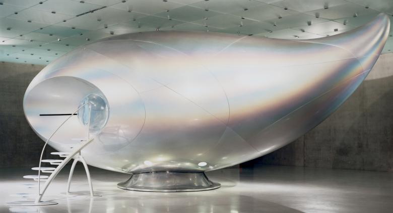 Mariko Mori, Wave UFO, 1999-2002, Brainwave interface, vision dome, projector, computer system, fiberglass, Technogel, acrylic, carbon fiber, aluminum, and magnesium, 528 x 1134 x 493 cm. Installation view: Mariko Mori: Wave UFO, Kunsthaus Bregenz, Austria, 2003.