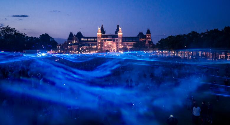 Waterlicht, 2015–present, LEDs, software, lenses, humidity, installation view at Museumplein, Amsterdam, 2015. Artwork © Daan Roosegaarde