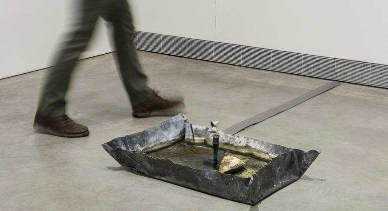 Marisa Merz, Fontana (Fountain), 2007. Lead, motor, stone, water and copper wire, 7 1/16 × 31 1/2 × 21 5/8 inches. Courtesy the Collection of Leo Katz.