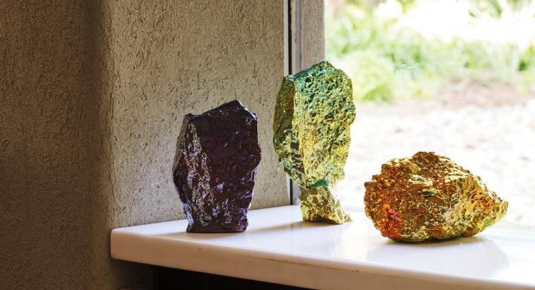 A Summer Arrangement: Object & Thing at LongHouse. LongHouse, East Hampton, New York. Photo by Adrian Gaut. Works pictured: [left to right] Julia Kunin, Purple Cliff, Green Providence and Fools Gold II (2022).