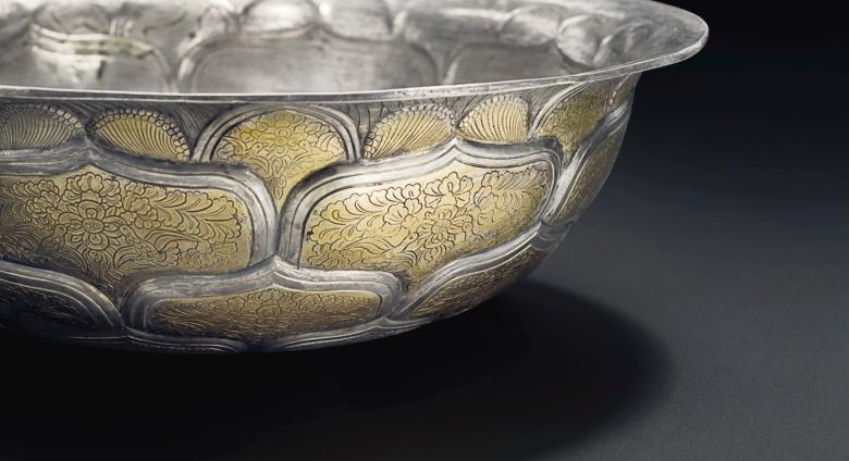 A very rare and important large parcel-gilt silver bowl, Tang dynasty (AD 618-907). Diameter 9⅝ in. Sold for $3,495,000.