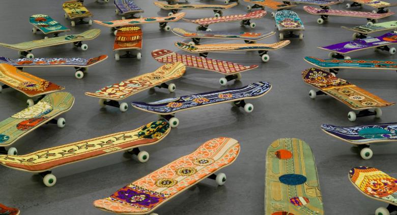 Mounir Fatmi, Maximum Sensation, 2010. Fifty skateboards, plastic, metal, textile, 5 × 8 × 31 11/16 in. (12.7 × 20.3 ×80.5 cm). Brooklyn Museum.