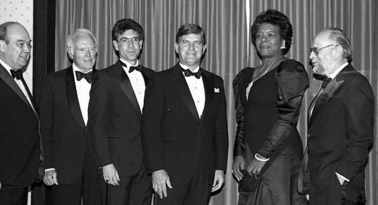 Maya Angelou, fellow award recipients, and Governor Jim Martin at the North Carolina Awards, November 6, 1987. Everyone pictured besides Maya is a white man. 