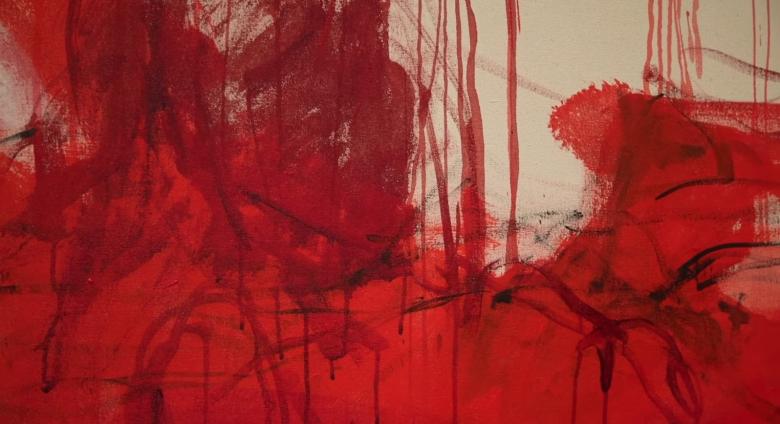 Close up of red, dripping painting by Emin