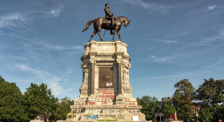 The recently defaced Robert E. Lee monument on Monument Avenue in Richmond, Virginia.