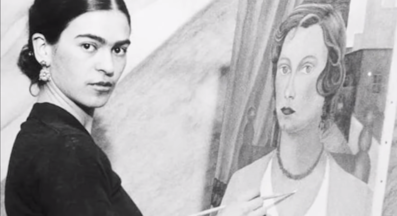 Frida Kahlo working on a painting