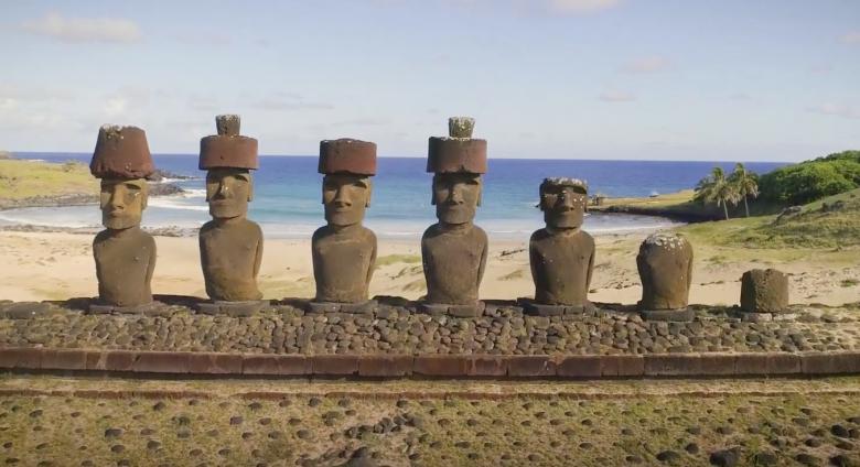 Easter Island heads in front of beach