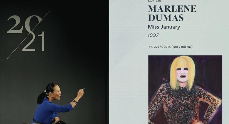 Auctioneer Yu-Ge Wang sells Miss January by Marlene Dumas for $13.6 million. Courtesy Christie's New York