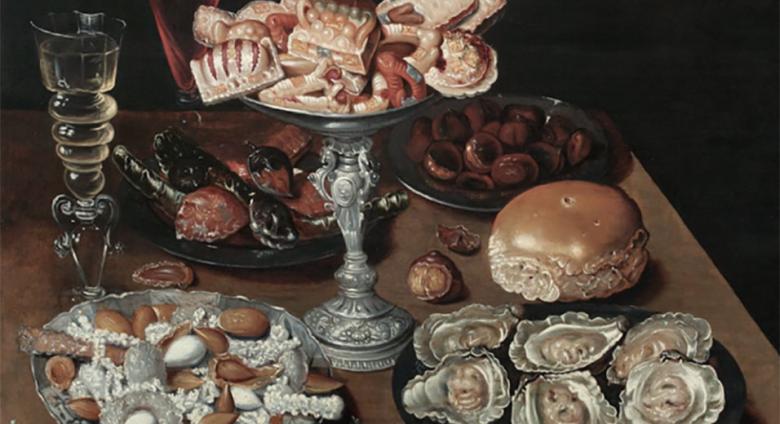 Dutch still life of a table top with oysters, bread and other foods