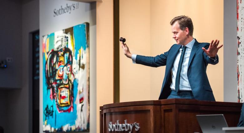 A live auction at Sotheby’s. Wikipedia.