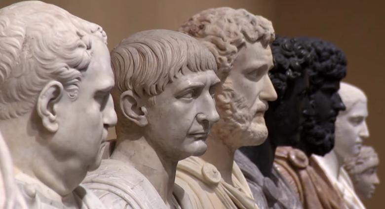 a line of of marble busts receding into the distance. 