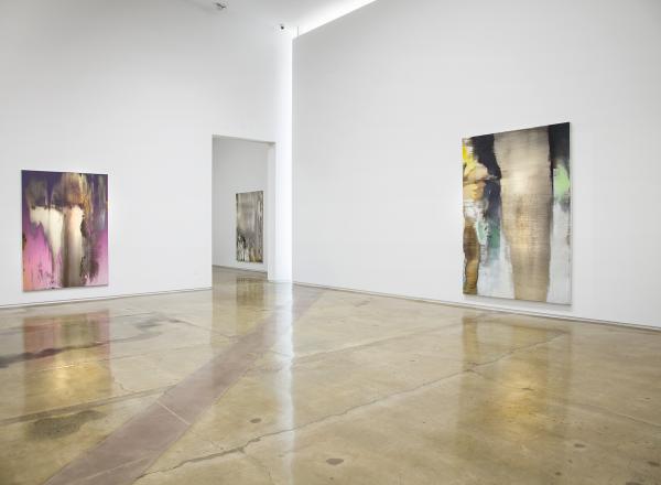 Installation view of Nir Hod: The Life We Left Behind at Kohn Gallery, Los Angeles. A large white room with large iridescent canvases 