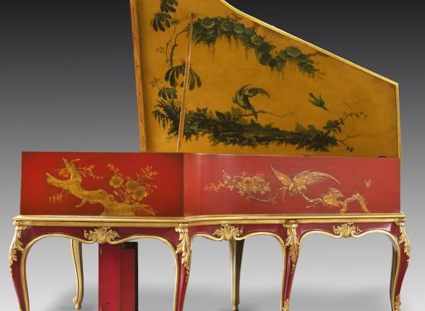 Red and yellow base with intricate, scrolling details in gold and green adorn this Auto Pleyela in a Chinoiserie Louis XV case. 