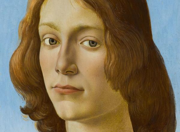 close up of the face of a Botticelli portrait of a young man with shoulder-length strawberry blonde hair