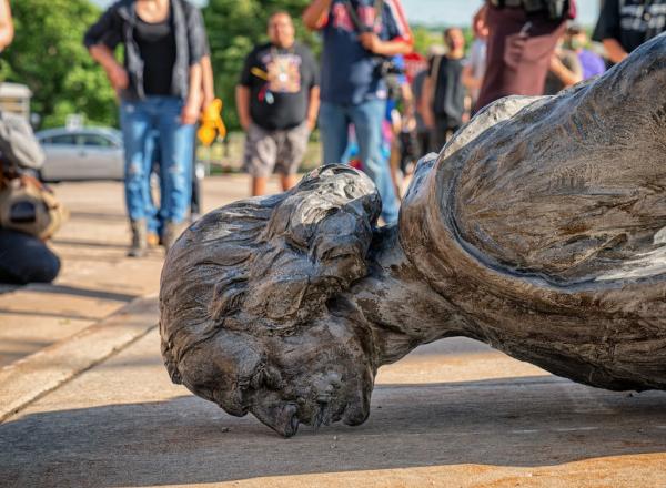 The fallen Christopher Columbus statue outside the Minnesota State Capitol after a group led by American Indian Movement members tore it down in St. Paul, Minnesota, on June 10, 2020.