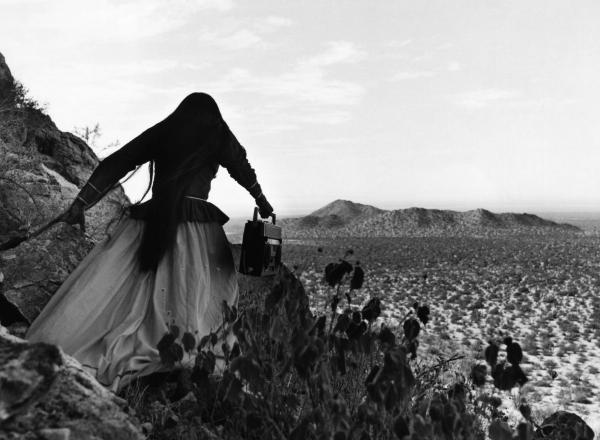 Graciela Iturbide, Angel Woman, Sonora Desert, Mexico, 1979 (printed later). Gelatin-silver print.