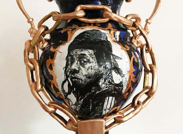 detail of Roberto Lugo ceramic vase with a portrait of Lil Wayne