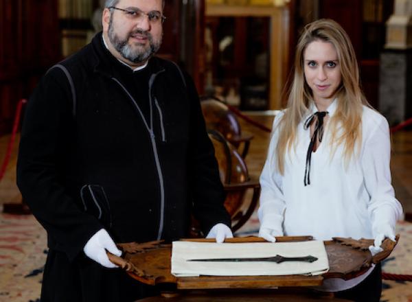 Father Serafino Jamourlian and Vittoria Dall'Armellina with the sword
