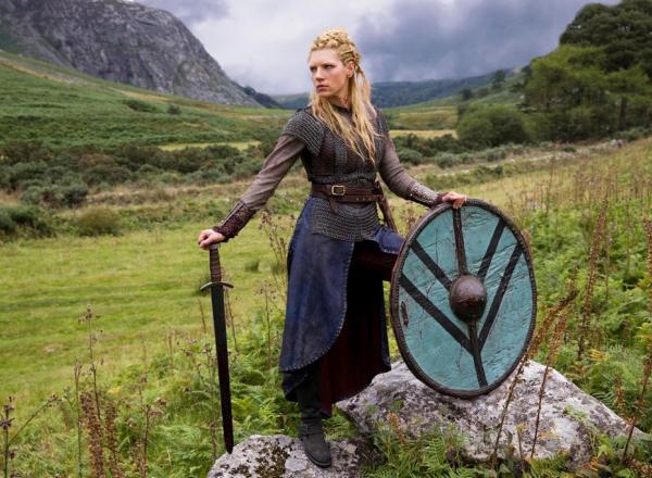 Katheryn Winnick as Lagertha from the popular History Channel show Vikings. Characters such as Lagertha exemplify the modern fascination with Viking warrior women, also known as Shield Maidens. Though dramatized for TV by Winnick, Lagertha is thought to be a historical individual known mainly through Norwegian folktales and the Danish history written in the 12th century CE by Saxo Grammaticus.