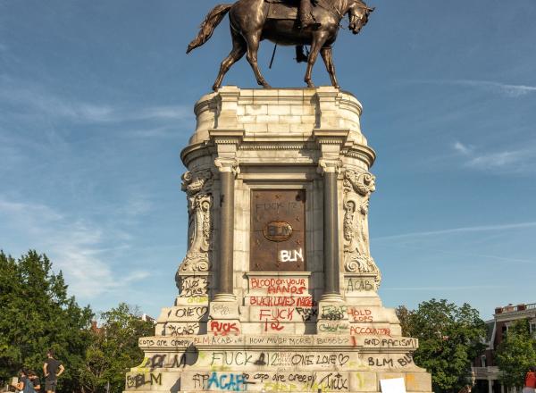 The recently defaced Robert E. Lee monument on Monument Avenue in Richmond, Virginia.