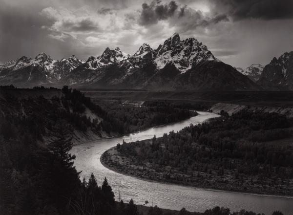 Ansel Adams black and white photograph of a river with mountains