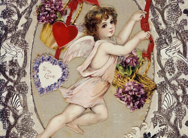 A cupid figure is framed by ornate, organic artwork