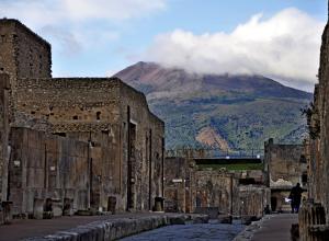 Pompeii excavations with Mount Vesuvius, 2011. License