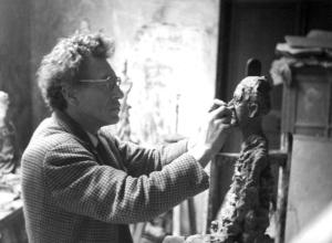 Alberto Giacometti in his studio in Montparnasse, Paris, photographed by his wife Annette.