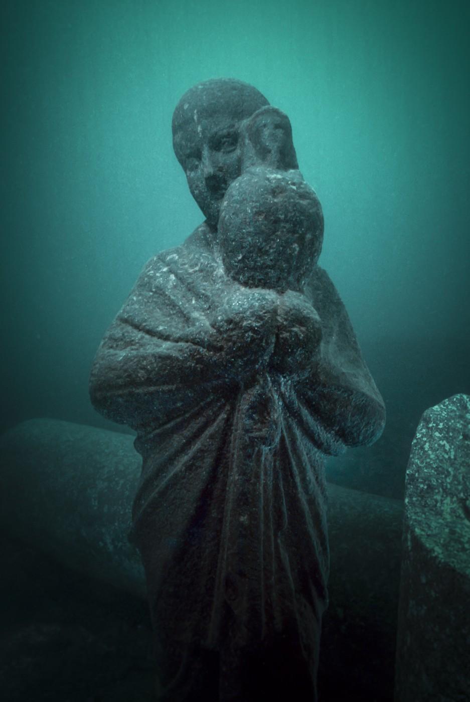 Priest holding an Osiris-Canopus in veiled hands, Alexandria, 1st century BC-2nd century AD