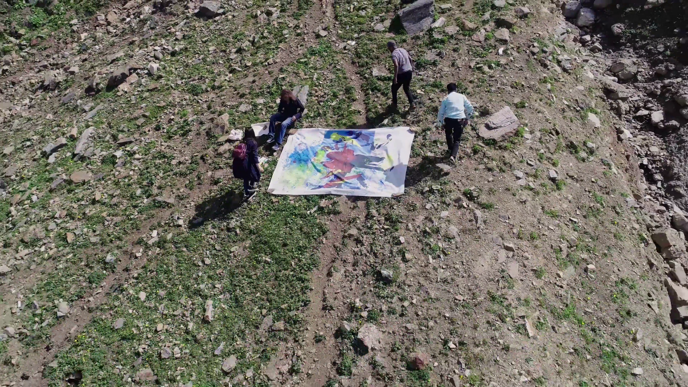 Nasser Azam painting on the mountain, August 2018