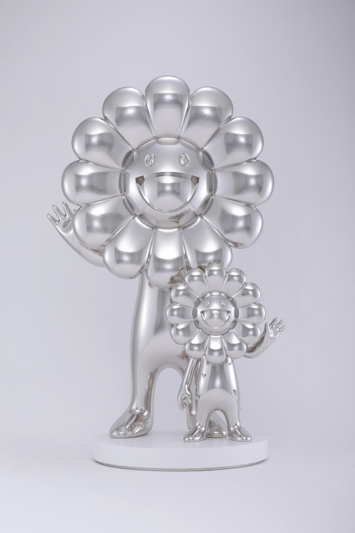 Takashi Murakami, Together with the Flower Parent and Child, 2021- 2023. Platinum leaf on FRP, wooden pedestal. Sculpture: 184.9 x 123.1 x 59.1 cm, Pedestal: 12 x 90 x 90 cm. © 2021-2023 Takashi Murakami/Kaikai Kiki Co., Ltd. All Rights Reserved. Courtesy of the artist and Perrotin, Paris, New York, Hong Kong, Shanghai, Tokyo, Seoul and Dubai