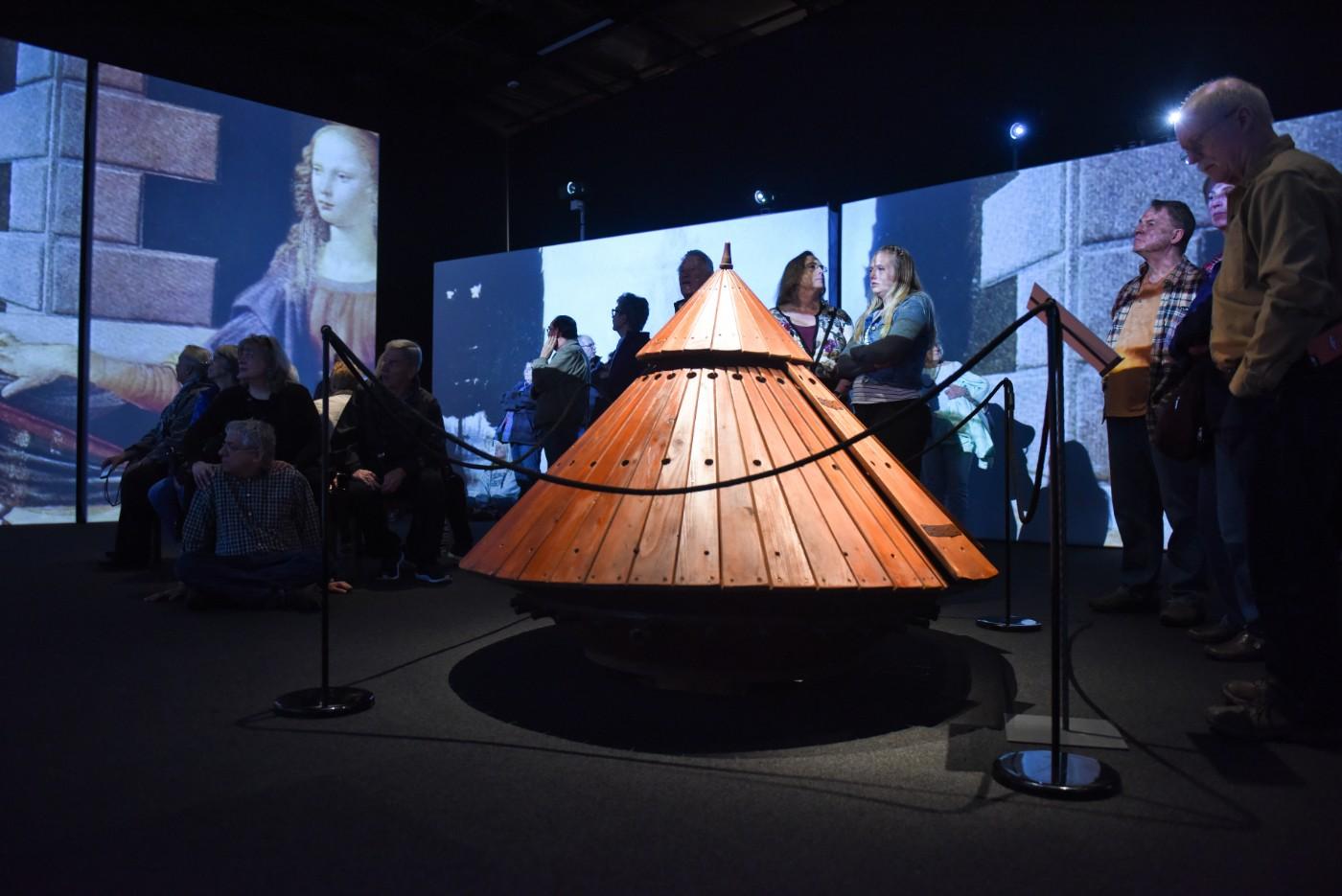 Visitors explore interactive models of da Vinci's inventions.