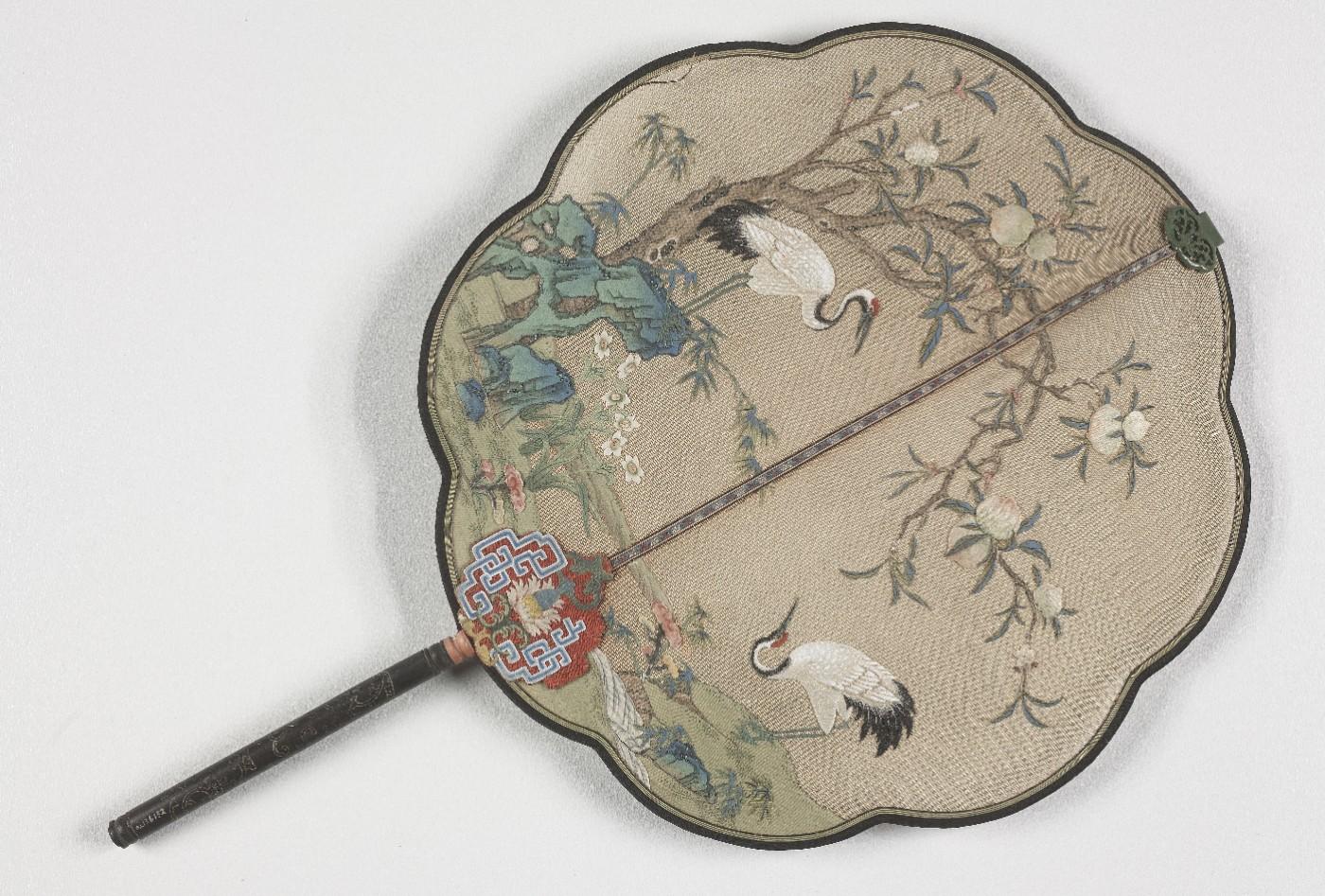 Lobed fan with cranes, peaches, and rocks