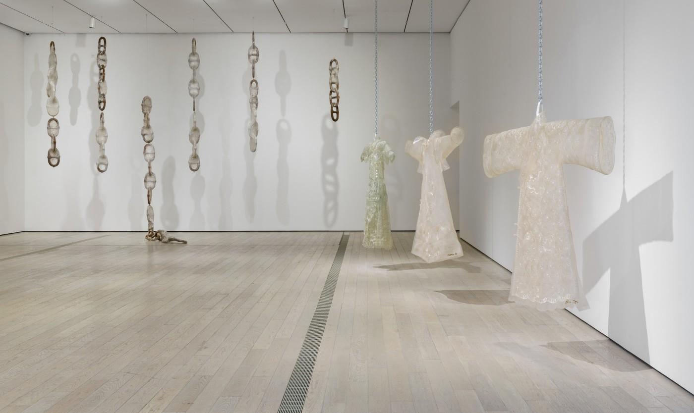 Installation photograph, featuring Liang Shaoji's Chains: The Unbearable Lightness of Being, Nature Series No. 79 (2002-2007) and Wang Jin's A Chinese Dream (2006), The Dream of China: Dragon Robe(1997) and Chinese Dream(2005)