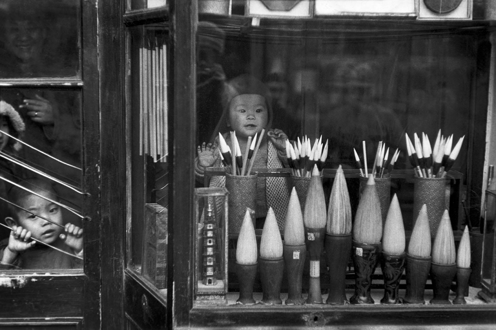 The window display of a brush merchant in the antique dealers’ street, Beijing, December 1948.