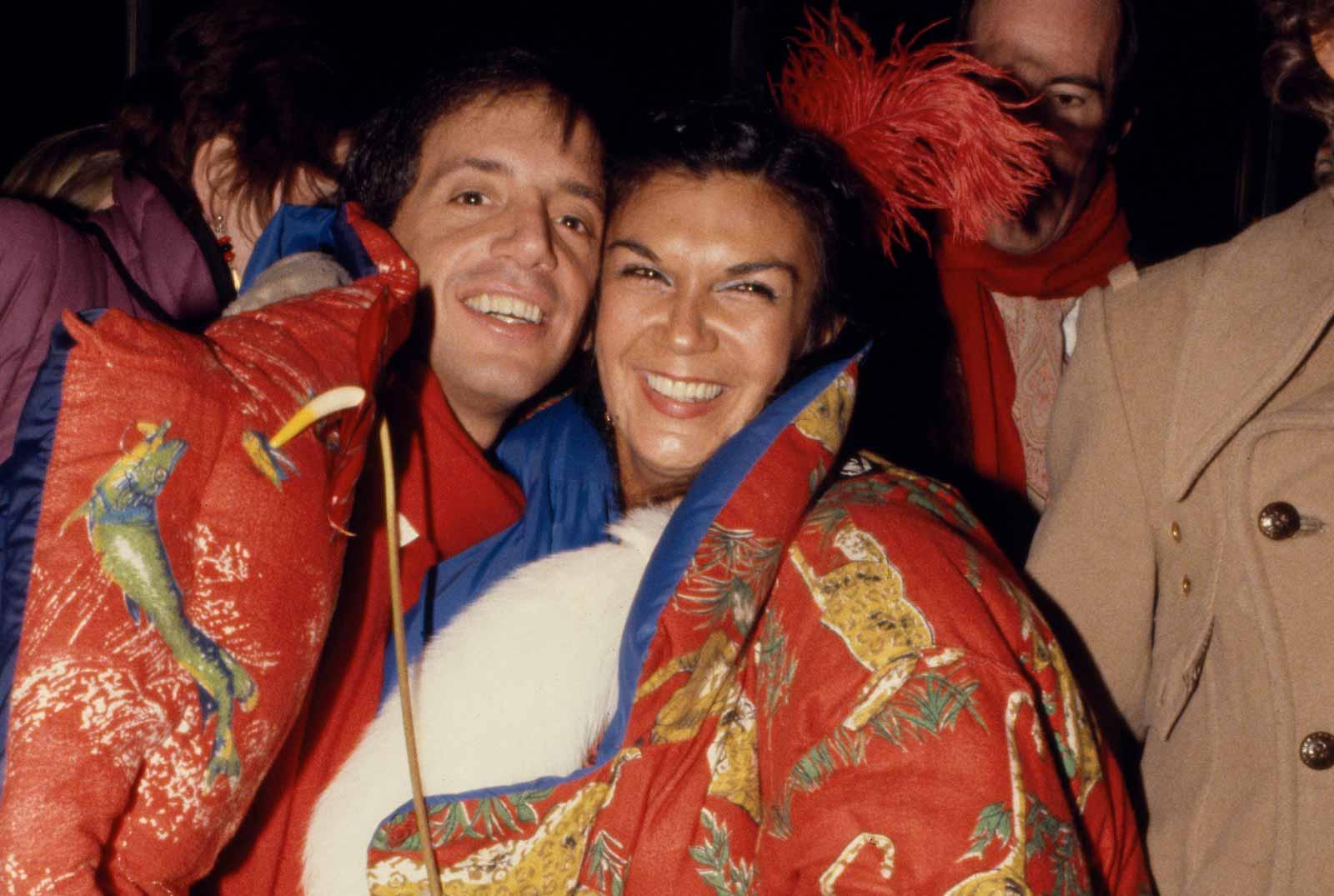 Steve Rubell and Carmen d'Alessio in Norma Kamali coats, 1977.